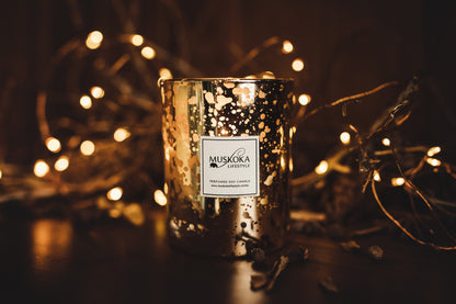 Our signature heart-warming Christmas fragrance which smells of clove, cinnamon, nutmeg, citrus zest, oranges and fir, is encased in a stunning gold festive vessel that features our pearlised sticker on its front, and it is adorned with a metallic gold ribbon with a pearlised swing tag attached.