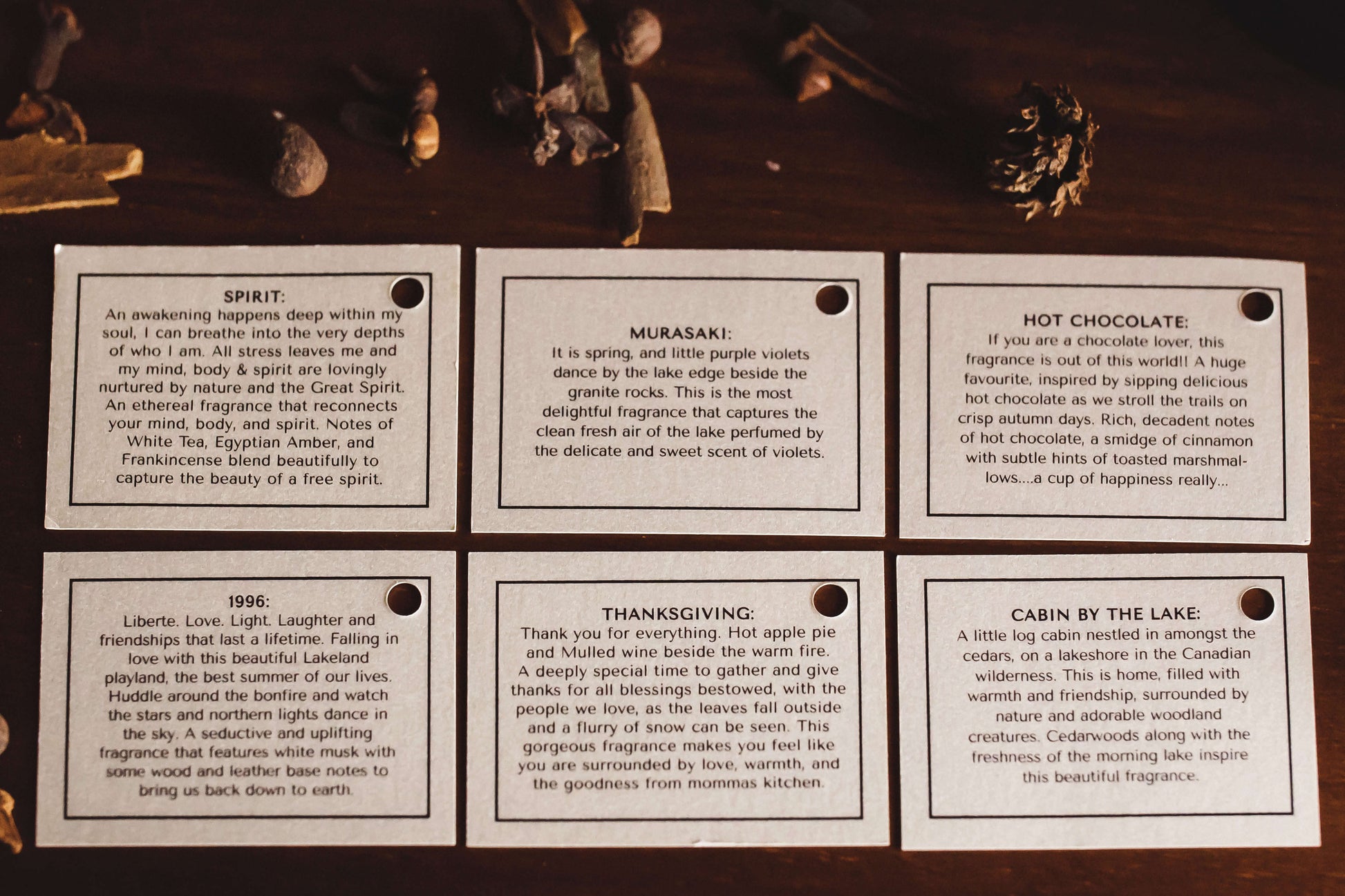 Our Muskoka Lifestyle North American Storyboard side by side: Murasaki, Spirit, Cabin by the Lake, 1996, Thanksgiving, and Hot Chocolate. We believe that the love we put into making these beautiful candles will be received by the person burning them.