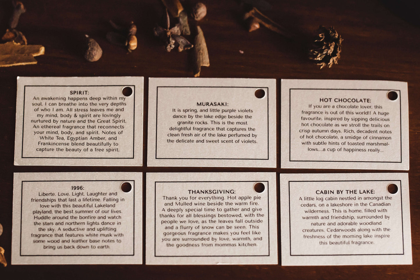 Our Muskoka Lifestyle North American Storyboard side by side: Murasaki, Spirit, Cabin by the Lake, 1996, Thanksgiving, and Hot Chocolate. We believe that the love we put into making these beautiful candles will be received by the person burning them.