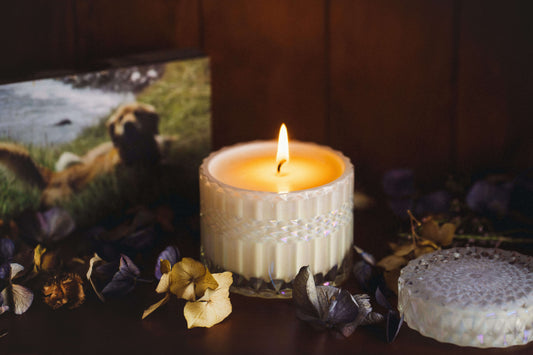 A gorgeous candle set in a Darcy style opal tinted cut glass vessel, created to gift to those who are grieving the loss of a dearly loved pet. A beautiful ethereal fragrance, a soft bouquet of white tea with notes of ginger. It is finished with a fine ivory satin ribbon and swing tag. Weight 655grams. Burn time 75hrs.